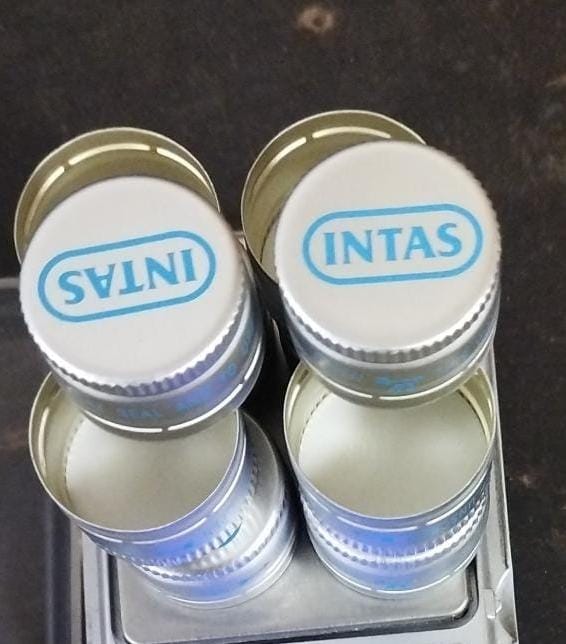 Intas logo 22mm pp caps.